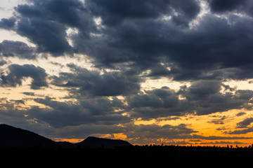 Colorful sunset over the mountain hills