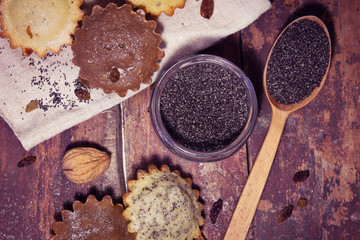 Home-made muffins with raisins and nuts 