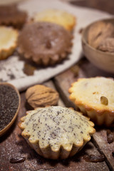 Home-made muffins with raisins and nuts 