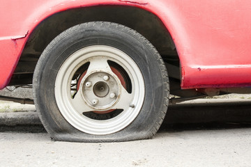 Fototapeta na wymiar Car flat tire waiting help.