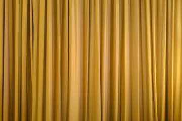 Yellow or gold color curtain for background interior.