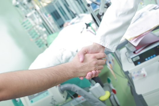 Doctor handshake as a sign of the success of treatment