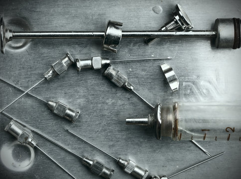 Obsolete glass syringe and needles