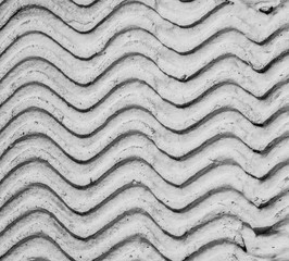 Gray decorative relief plaster on wall