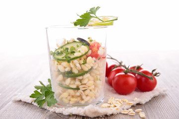 vegetarian salad with barley and cucumber