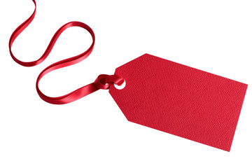 Red gift tag or label tied with red ribbon isolated on white background for christmas or birthday present photo