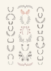 Set of symmetrical floral graphic design elements.