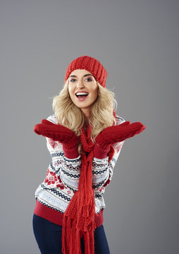 Positive emotions of woman in winter clothing