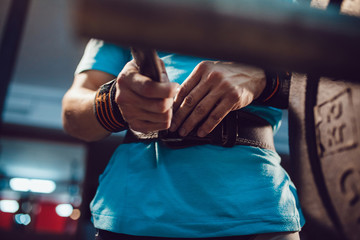 Athletes preparing for barbell exercises