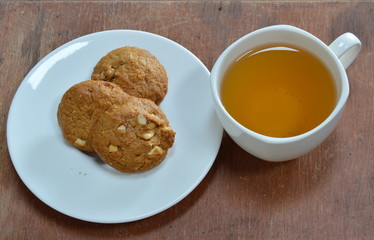peanut butter cookie and cup of tea