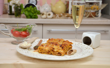 Served lasagna and spices