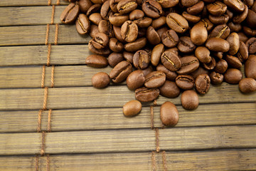 Coffee beans on vintage wooden board