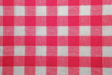 The texture of checkered fabric as a background.