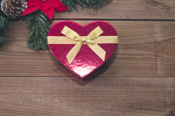 Christmas hearts on wooden background