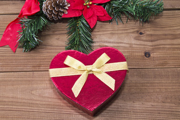 Christmas hearts on wooden background