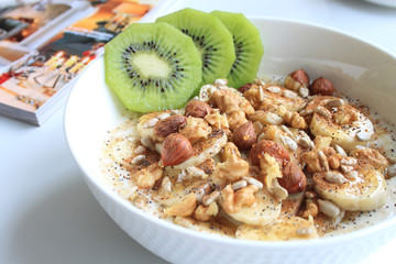 Breakfast oatmeal with milk and fruits