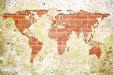 grunge concrete world map on old brick wall