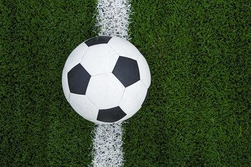 soccer ball or football on soccer field