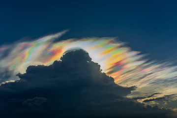 Cloud iridescence : diffraction phenomenon produce very vivid color and make cloud shine like a...