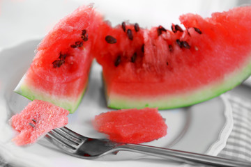 Sliced watermelon on plate closeup