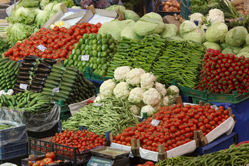 Vegetables and fruits on food stall in a market 