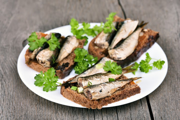 Fish sandwiches with sprats