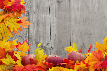 Naklejka na ściany i meble Autumn Leaves and Apples Background
