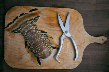 Lobster tail top view with scissors