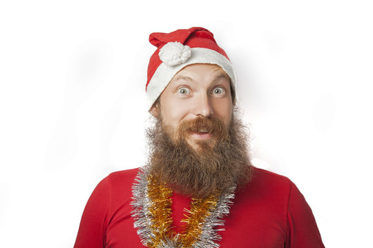 happy funny santa claus with real beard and red hat and shirt