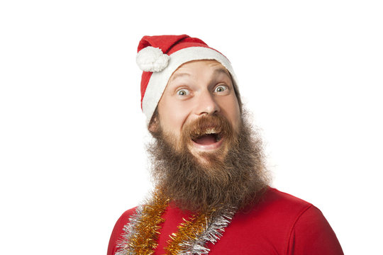 happy funny santa claus with real beard and red hat and shirt.