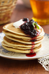 Buttermilk pancakes with berries and cream