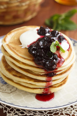 Buttermilk pancakes with berries and cream