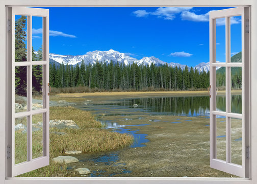 Fototapeta Open window view to snow mountains peaks