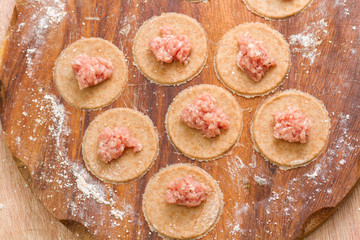 Homemade Italian tortellin from wholegrain flour with meat. Step