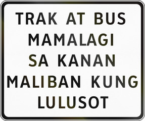 Road sign in the Philippines - Trucks and buses keep right except overtaking