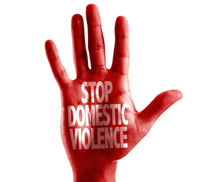 Stop Domestic Violence written on hand isolated on white background