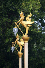 Fototapeta na wymiar Golden angel electric pole