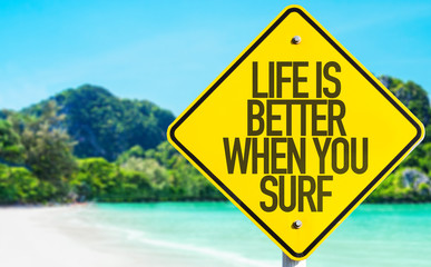 Life is Better When You Surf sign with beach background
