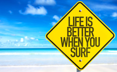 Life is Better When You Surf sign with beach background