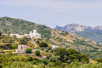 Fototapeta na wymiar The Greek Church in the picturesque mountains of Naxos island, Cyclades, Greece.