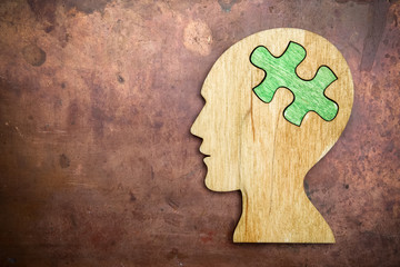 man head silhouette with jigsaw