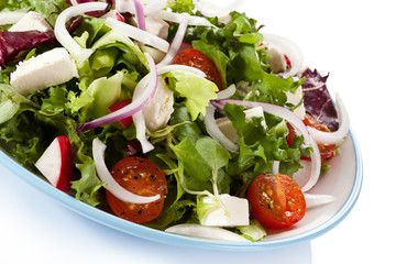 Greek salad on white background 