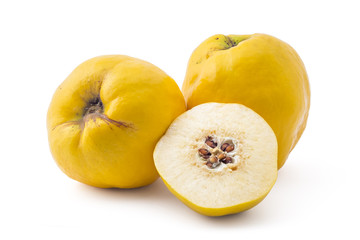Fresh ripe yellow quinces, one cutted on half, isolated on white background - 97374562