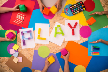 Children playing together - obrazy, fototapety, plakaty