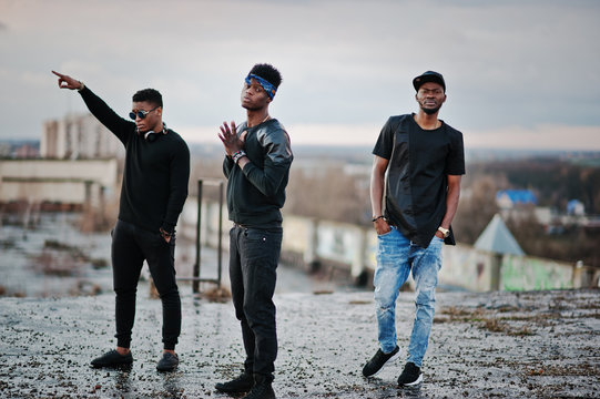 Three rap singers band on the roof