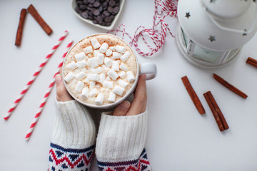 coffee with marshmallow with tubes , korritsey and chocolate and white lighthouse