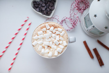 coffee with marshmallow with tubes , korritsey and chocolate and white lighthouse