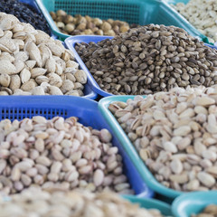 Spices and vegetables in bags at local bazaar in Osh. Kyrgyzstan