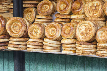 Kirghiz bread tokoch on Sunday market in Osh. Kyrgyzstan.