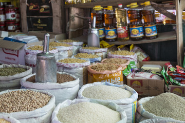 Spices and vegetables in bags at local bazaar in Osh. Kyrgyzstan